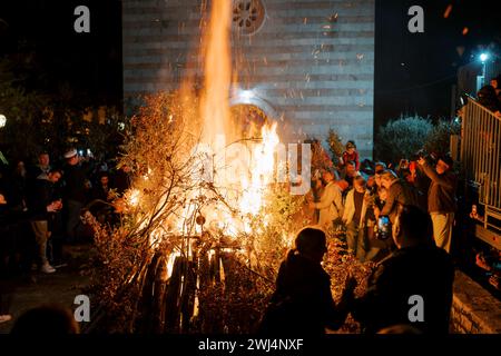 Budva, Montenegro - 06 january 2024: Traditional Oak Branch Bonfire on Christmas Eve in Budva Stock Photo