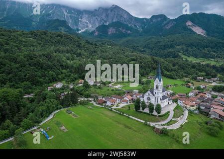 DreÅ¾nica village, Slovenia. Drone aerial view. Picturesque rural green landscape Stock Photo