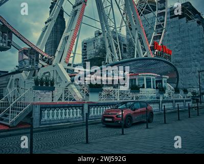Brussels, Belgium. 9 02 2024. Amusement ride Ferris wheel or giant wheel or an observation wheel. Large device with electric motors.The View Bruxelles Stock Photo
