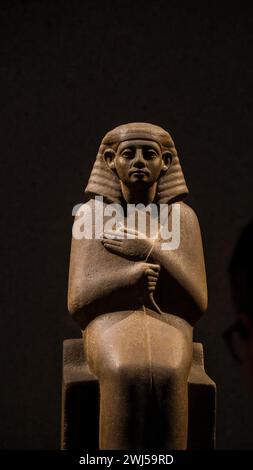 An ancient Egyptian figure displayed at the Neues Museum in Berlin Stock Photo