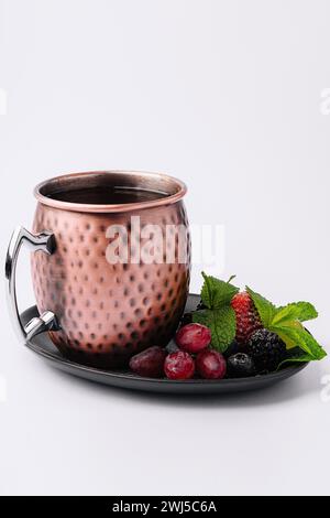 Rosehip tea with aniseed, mint and berries Stock Photo