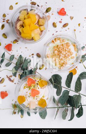 Soft chocolate and vanilla ice cream with pistachio, mango and jelly Stock Photo