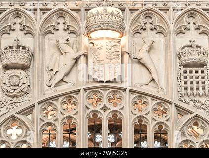Tudor dragon and greyhound with crown and coat of arms on a wall in the nave at King's College chapel, Cambridge University, England. Stock Photo