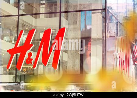 NEW YORK - CIRCA MARCH 2016: close up shot of H and M logo. H and M Hennes and Mauritz AB is a Swedish multinational retail-clot Stock Photo