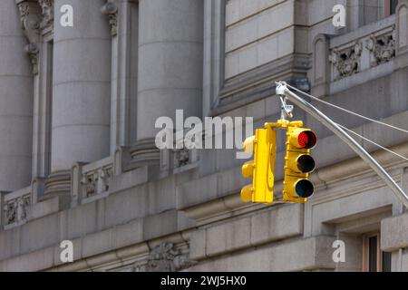 Yellow traffic lights on a street in New York city Stock Photo