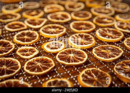 Dried orange slices. Dehydrated crispy fruit slices. Stock Photo