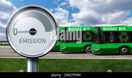 Gauge with inscription EMISSION. Arrow points to zero. Green buses on a background. Carbon neutral transportation concept. Stock Photo