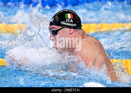 Doha, Qatar. 13th Feb, 2024. Simone Cerasuolo of Italy competes in the swimming 50m Breaststroke Men Heats during the 21st World Aquatics Championships at the Aspire Dome in Doha (Qatar), February 13, 2024. Credit: Insidefoto di andrea staccioli/Alamy Live News Stock Photo