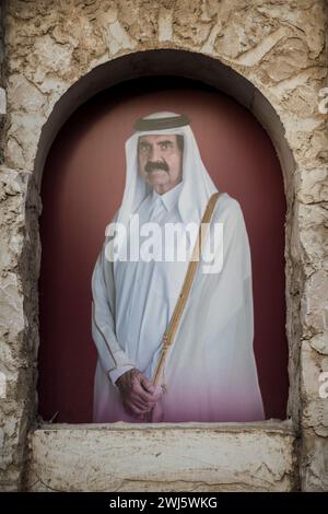 Doha, Qatar - December 18,2017. Hamad bin Khalifa al-Thani and Tamim bin Hamad Al Thani posters on the occasion of Qatar National Day. Stock Photo