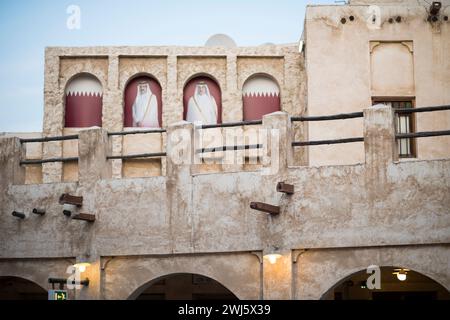 Doha, Qatar - December 18,2017. Hamad bin Khalifa al-Thani and Tamim bin Hamad Al Thani posters on the occasion of Qatar National Day. Stock Photo