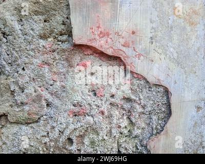 Fragile building walls are peeling off, old buildings with surfaces eroded by age Stock Photo