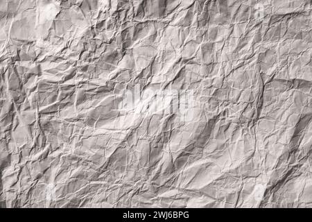 Texture of grey crumpled paper as a background. Stock Photo