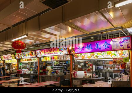 Traditional Asian food stalls in Hawker Center, Chinatown, Singapore Stock Photo