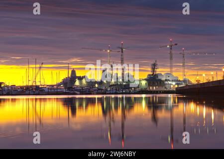 Norfolk, Virginia, USA shipyard on the Chesapeake at golden hourl. Stock Photo