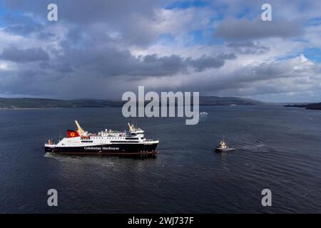 The Caledonian MacBrayne ferry MV Glen Sannox undergoes a sea trial, accompanied by tugs, on a short trip under her own propulsion from Ferguson Marine yard in Port Glasgow, Inverclyde. Picture date: Tuesday February 13, 2024. Stock Photo