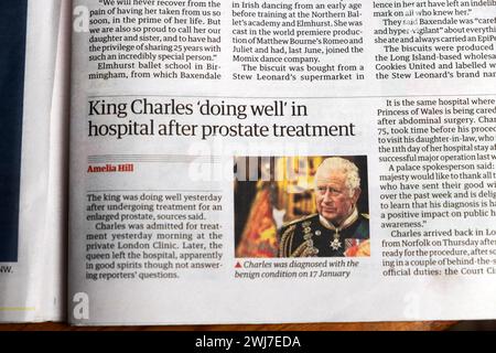 'King Charles 'doing well' in hospital after prostate treatment' Guardian newspaper headline king's health article 27 January 2024 London England UK Stock Photo