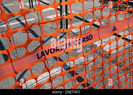 high visibility net, work in progress on a construction site, fence of a construction site with high visibility orange colored elements. safety Stock Photo