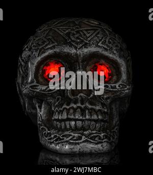 Skull with Red Eyes Glowing in the Dark. Stock Photo