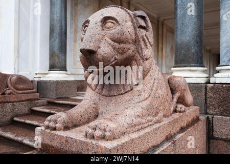 Granite lion at the entrance of The marble Voronikhin colonnades received their name after their creator, the former serf Andrei Voronikhin. It was bu Stock Photo