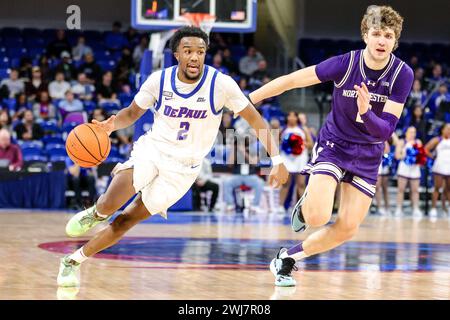 Chico Carter Jr. #2 Guard from the DePaul Blue Demons dribbling towards the basket in Chicago, IL at Wintrust Arena. Stock Photo