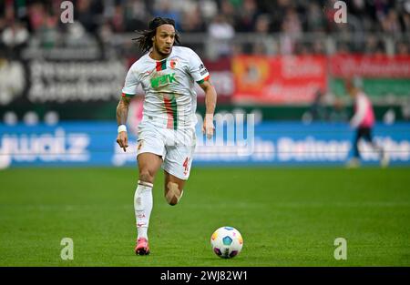 Kevin Mbabu FC Augsburg FCA (43) Action, on the ball, WWK Arena, Augsburg, Bavaria, Germany Stock Photo