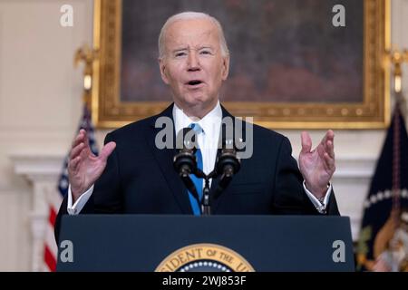 US President Joe Biden delivers remarks in the State Dining Room of the White House in Washington, DC, USA. 13th Feb, 2024. President Biden urged the US House of Representatives to pass a 95 billion USD bill with aid to Ukraine, Israel and Taiwan. The plan passed with bipartisan support in the Senate but is unlikely to pass in the Republican-controlled House due to opposition from hard-right conservatives supporting former US President Donald J. Trump. Credit: Abaca Press/Alamy Live News Stock Photo