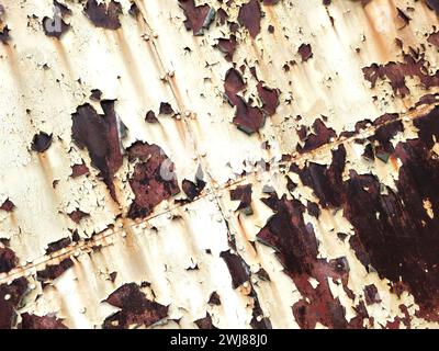 Peeling paint and rust on hangar doors Stock Photo