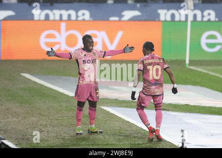 Swansea, UK. 13th Feb, 2024. Wilfried Gnonto of Leeds Utd (l) celebrates with Crysencio Summerville of Leeds Utd (10) after he scores his teams 4th goal . EFL Skybet championship match, Swansea city v Leeds Utd at the Swansea.com Stadium in Swansea, Wales on Tuesday 13th February 2024. this image may only be used for Editorial purposes. Editorial use only, pic by Andrew Orchard/Andrew Orchard sports photography/Alamy Live news Credit: Andrew Orchard sports photography/Alamy Live News Stock Photo