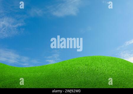 Lush green grass under blue sky with fluffy clouds on sunny day Stock ...