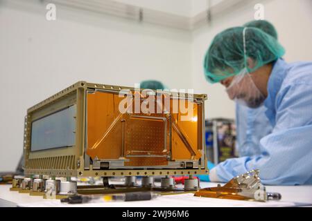 Engineers working on CubeSats for Artemis I Stock Photo