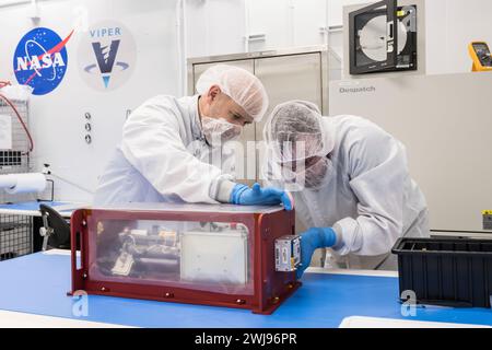 Engineers examining MSolo instrument for VIPER Stock Photo