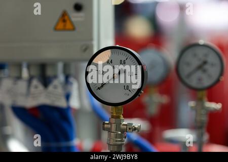 Pressure gauges and fire extinguishing equipment. Selective focus. Stock Photo