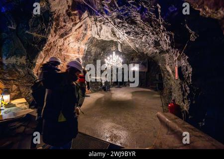January 30, 2024, Eide, MÃ¸Re Og Romsdal, Norway: Several visitors tour a room made of marble during a visit to the Bergtatt mine. Bergtatt is an outstanding marble mine located in the county of MÃ¸re og Romsdal, near the town of Eide, in the western region of Norway. It offers guided tours through subterranean caves. The experience includes a boat ride on an illuminated subway lake and a concert hall carved into the marble. The site is known for its natural beauty and unique acoustics, making it a memorable destination for visitors. (Credit Image: © Jorge Castellanos/SOPA Images via ZUMA Pres Stock Photo