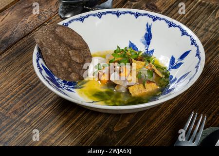 A delectable fusion cuisine dish featuring a combination of local and seasonal products from a Michelin-starred restaurant in Zermatt, Switzerland, ar Stock Photo