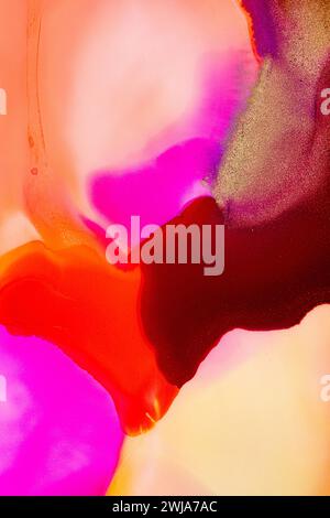 A vividly colored abstract image showcasing a fluid amalgamation of pink, orange, and red hues with a hint of gold shimmer. Stock Photo
