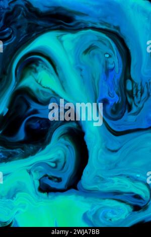 A striking abstract image featuring swirling patterns of blue and green, resembling a fluid or marble backdrop Stock Photo