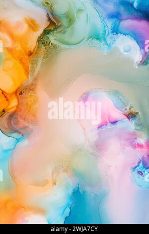 This image showcases a vibrant mix of soft pastel hues blended in a flowing abstract art form, creating a dreamy and ethereal visual texture Stock Photo