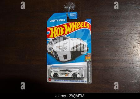 Hot Wheels is an American brand of scale model cars invented by Elliot Handler and introduced by his company Mattel on May 18, 1968. Liberty Walk car. Stock Photo