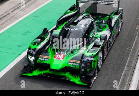 Close-up Aerial view of Steve Tandy's Black and Green, 2014, HDP Honda ARX-04, exiting the pit lane to start the Masters Endurance Legends Race Stock Photo