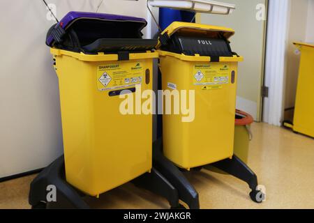 Sharps and Medical Waste Bins in Hospital Epsom Surrey England Stock Photo