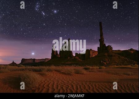 The night sky filled with stars above Monument Valley, Arizona. Stock Photo