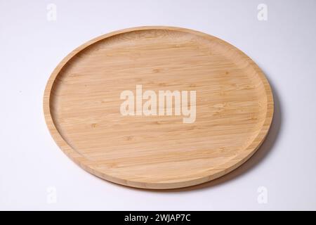 Empty Bamboo wooden round plank on white background Stock Photo