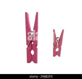 Clothes pegs isolated on white transparent, two sizes pink color clothepins, Stock Photo