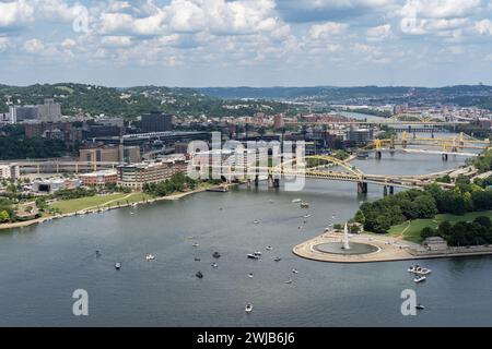 Pittsburgh, Pennsylvania - July 22, 2023: Boats gather around The Point in downtown Pittsburgh on a warm summer day Stock Photo