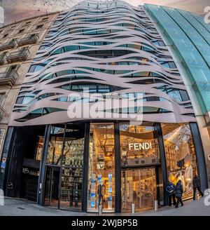 Barcelona, Catalonia, Spain - February 27, 2022: Architectural detail of the commercial building facade designed by architect Toyo Ito.  Located on Pa Stock Photo