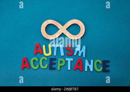 Celebrating Autism Acceptance Month. The gold infinity symbol Stock Photo