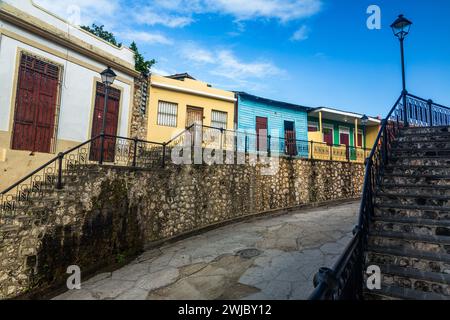 Colorfully painted old houses on Calle Hostos in the Colonial City of Santo Domingo in the Dominican Republic.  A UNESCO World Heritage Site.  This st Stock Photo
