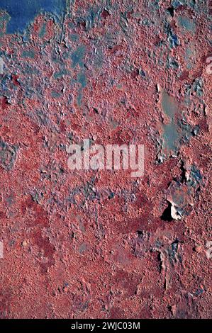 Corroded metal background. Rusted blue painted metal wall. Rusty metal background with streaks of rust. Rust stains. The metal surface rusted spots. R Stock Photo