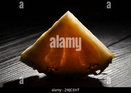single pineapple on wood background Stock Photo