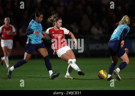 Dartford, UK. 14th Feb, 2024. Dartford, Kent, 14 February 2024: Victoria Pelova (21 Arsenal) and Izzy Groves (10 London City Lionesses) battle for possession during the Continental Tyres League Cup football match between London City Lionesses and Arsenal at Princes Park in Dartford, England. (James Whitehead/SPP) Credit: SPP Sport Press Photo. /Alamy Live News Stock Photo